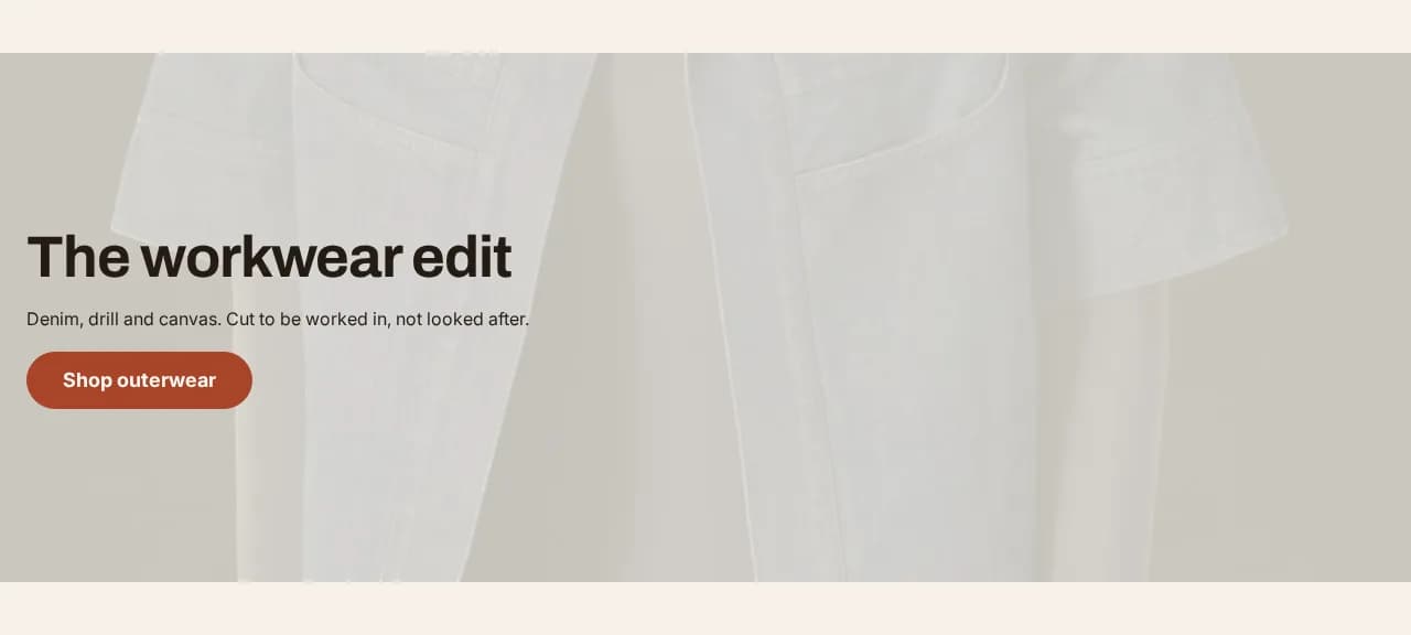 A full-width image banner with a heading and a button over the photograph
